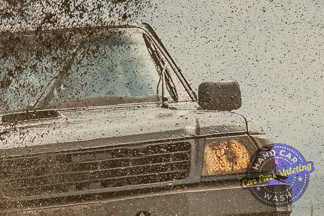 image of dirt on large car branded with cpv hand car wash watford company logo