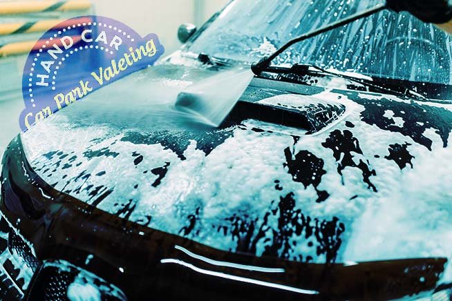 hand car wash service car cleaning top view on hood on  are hand car washes bad for your car article