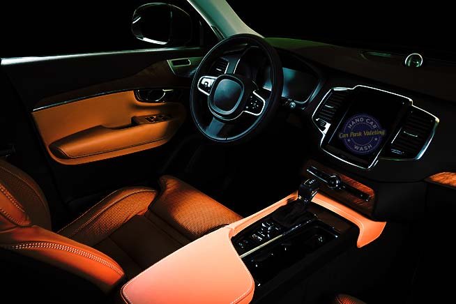 luxury car interior with cpv hand car wash logo