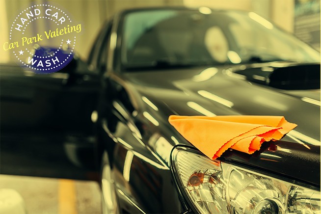 image of drying a subaru with a towel for a blog on how to get rid of dried water spots for cpv car wash web site