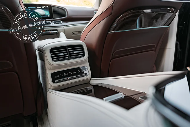 image of car center console clear of any dog hair for blog about hack for removing dog hair from car by cpv car wash